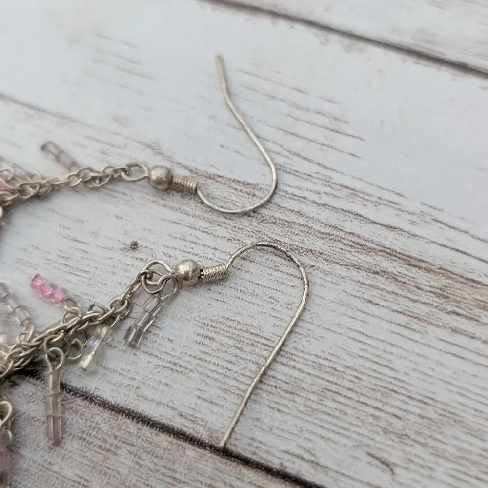 Unknown dangle earrings