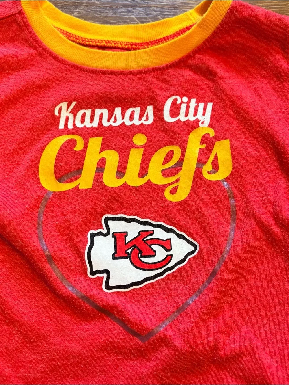 NFL logo sleeves holes