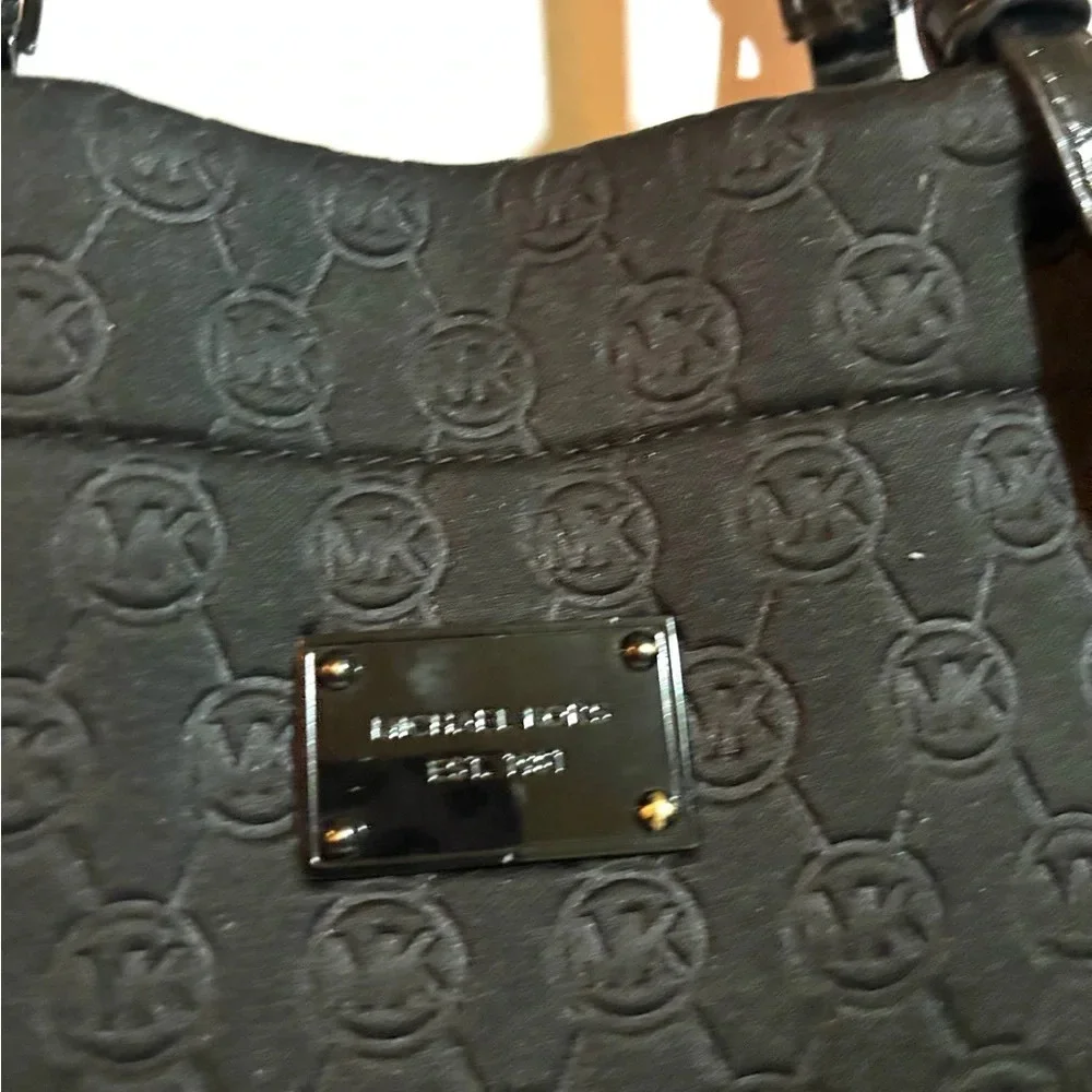 Michael Kors mk logo