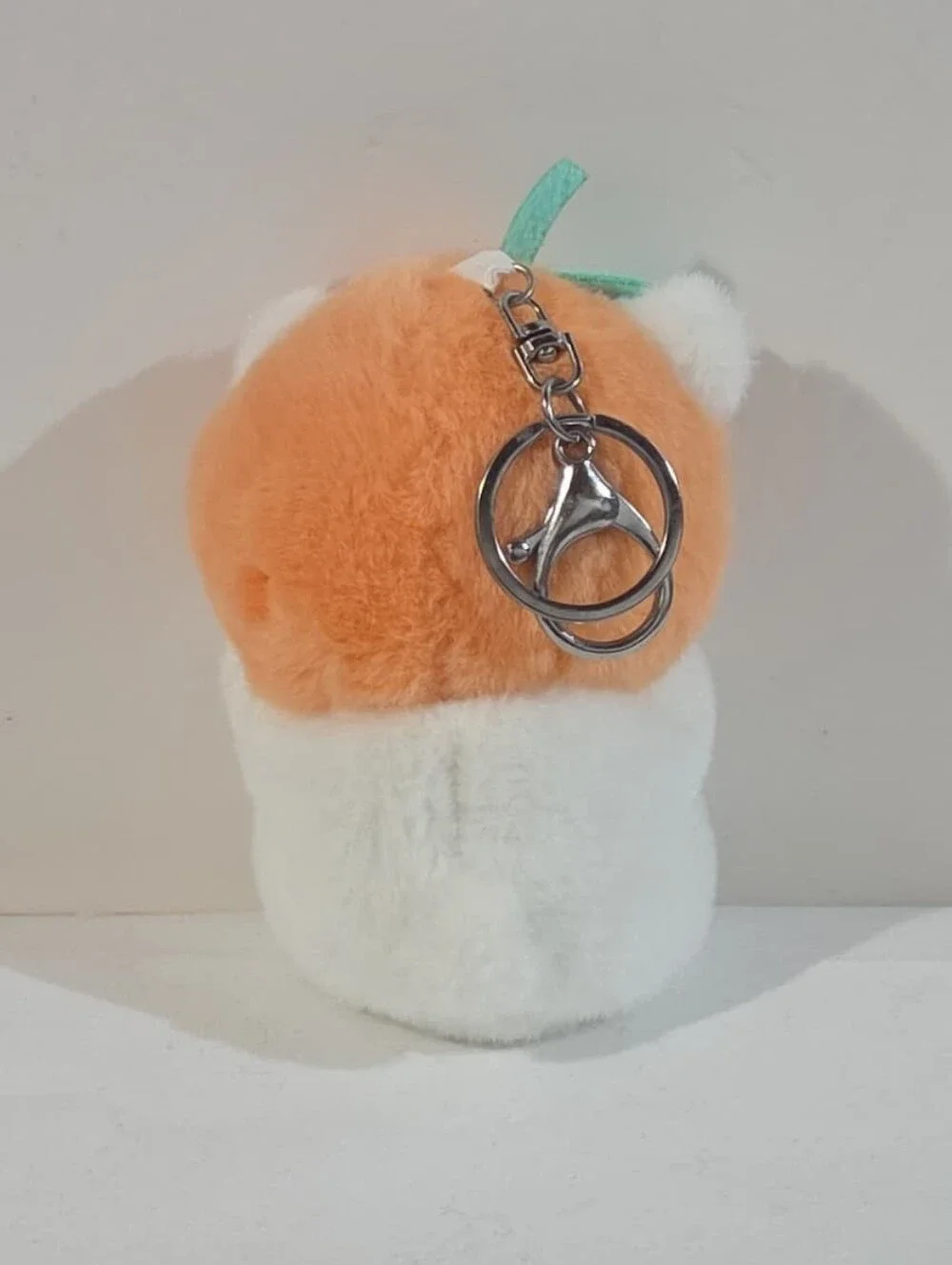 white bear with orange hat plushie keychain