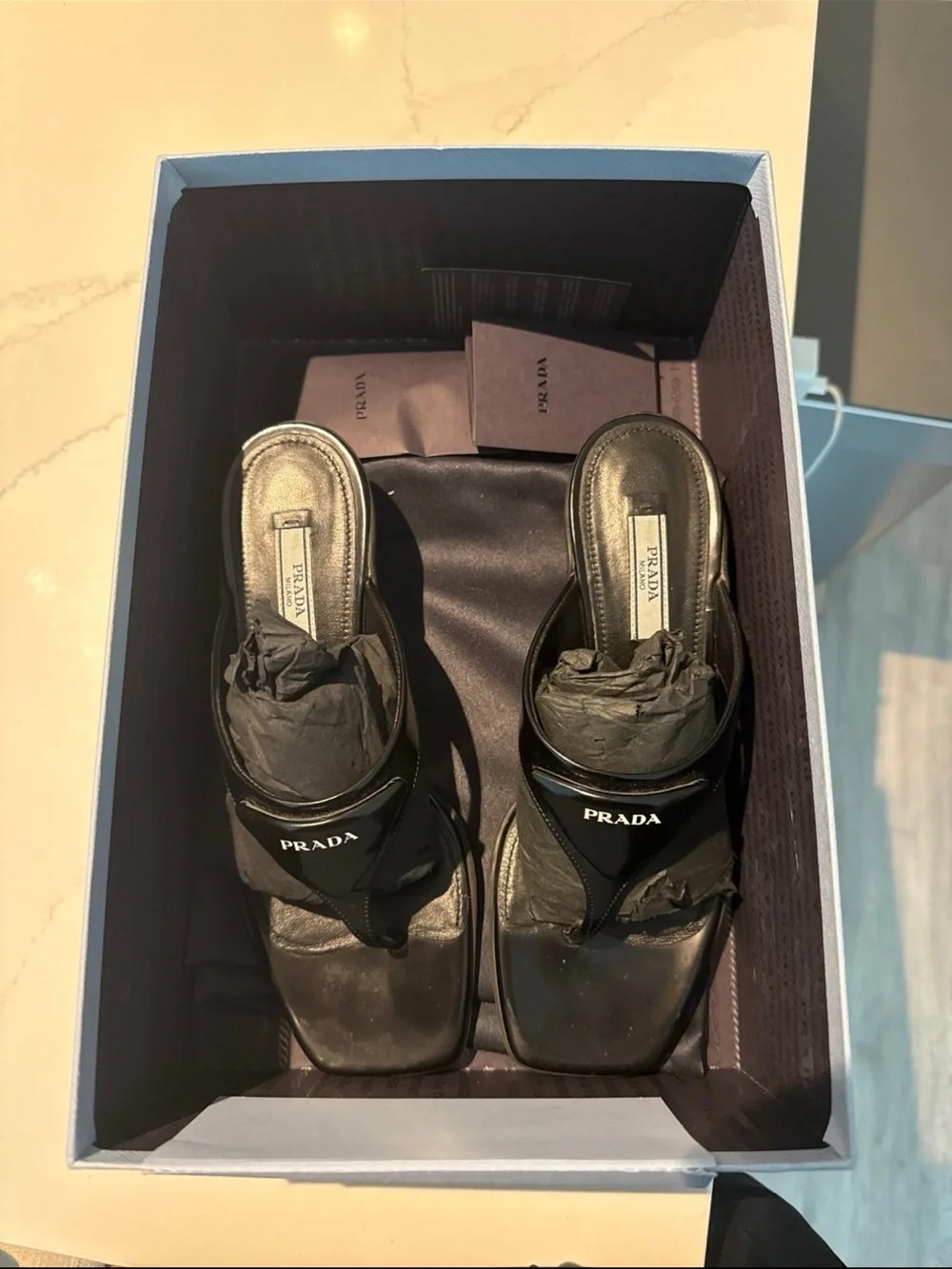 Prada iconic logo