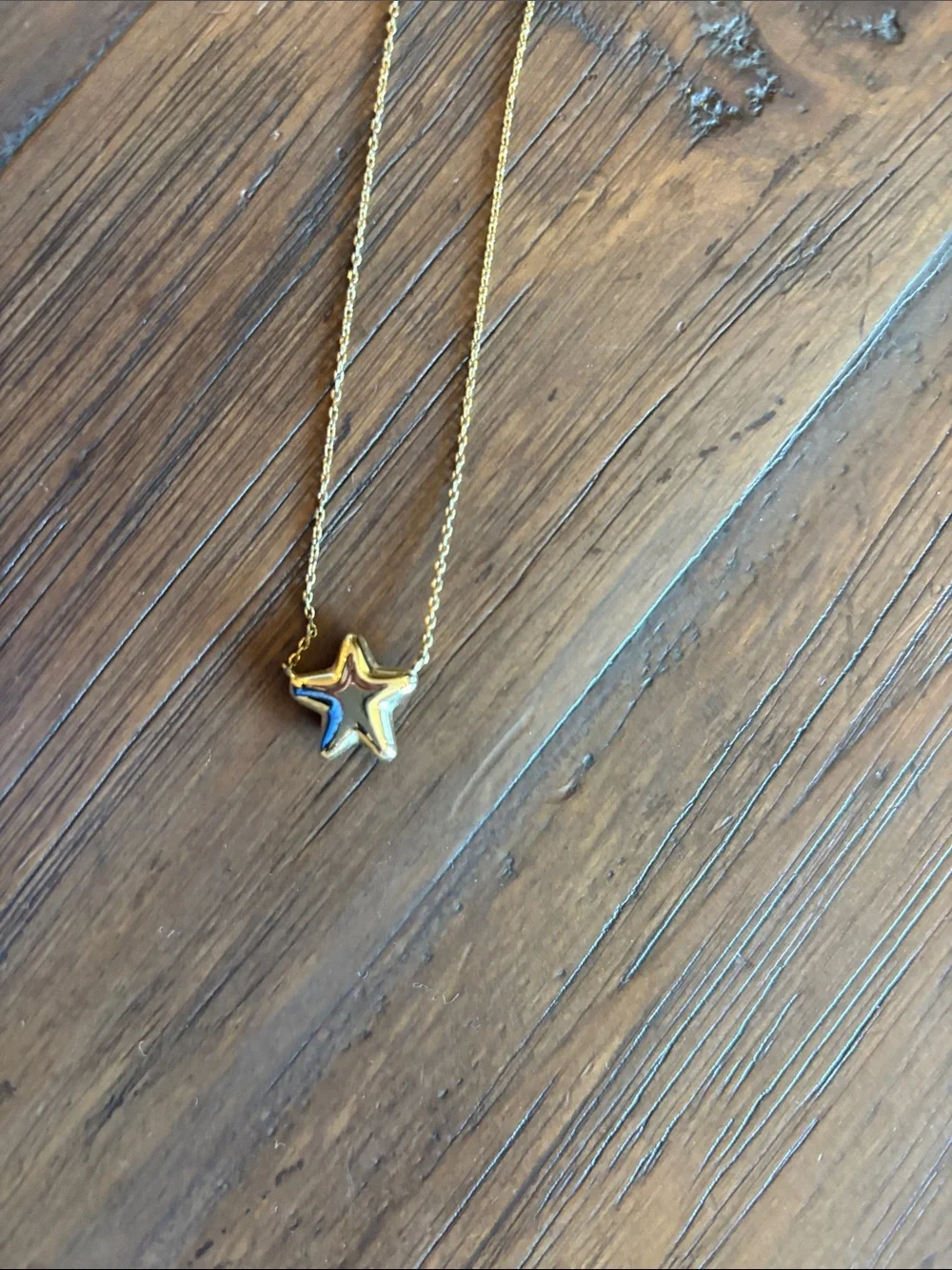 Kendra Scott Gold Star Necklace with Black Center