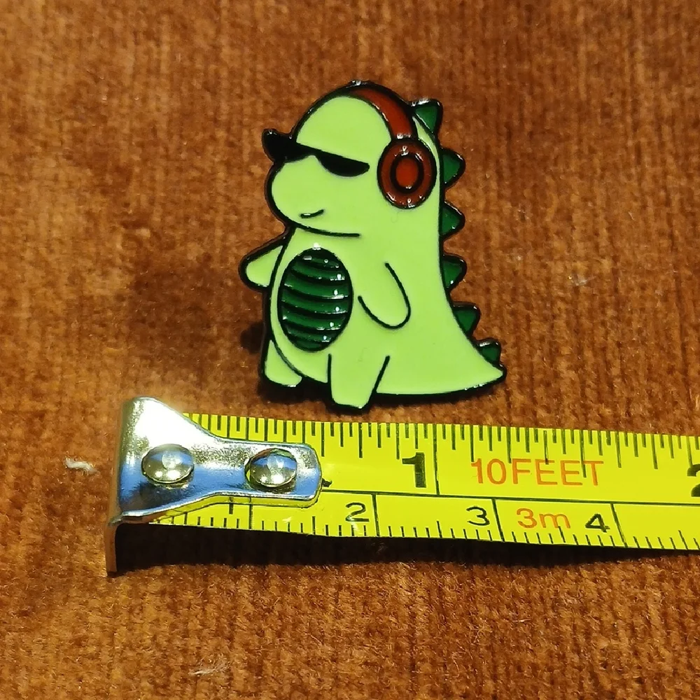 NEW Cartoon Dinosaur with Headphones Enamel Pin