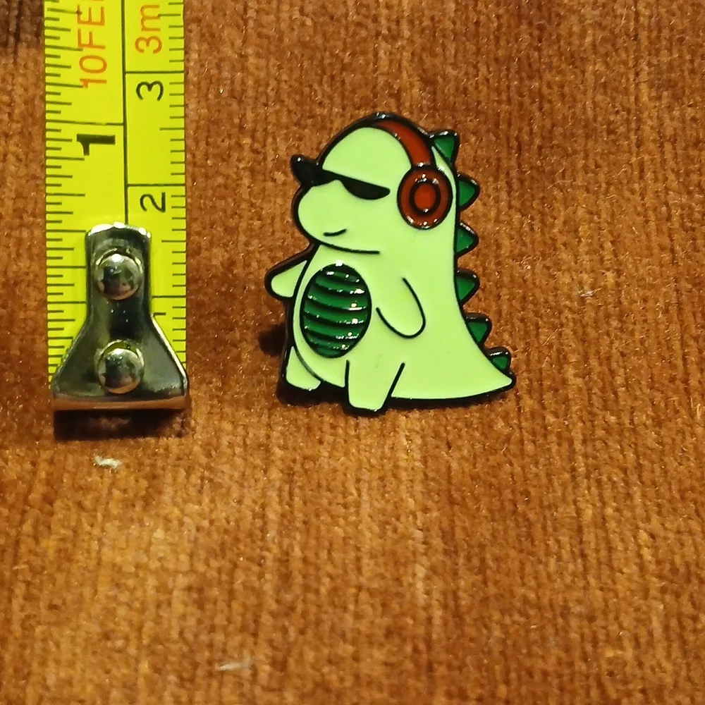 NEW Cartoon Dinosaur with Headphones Enamel Pin