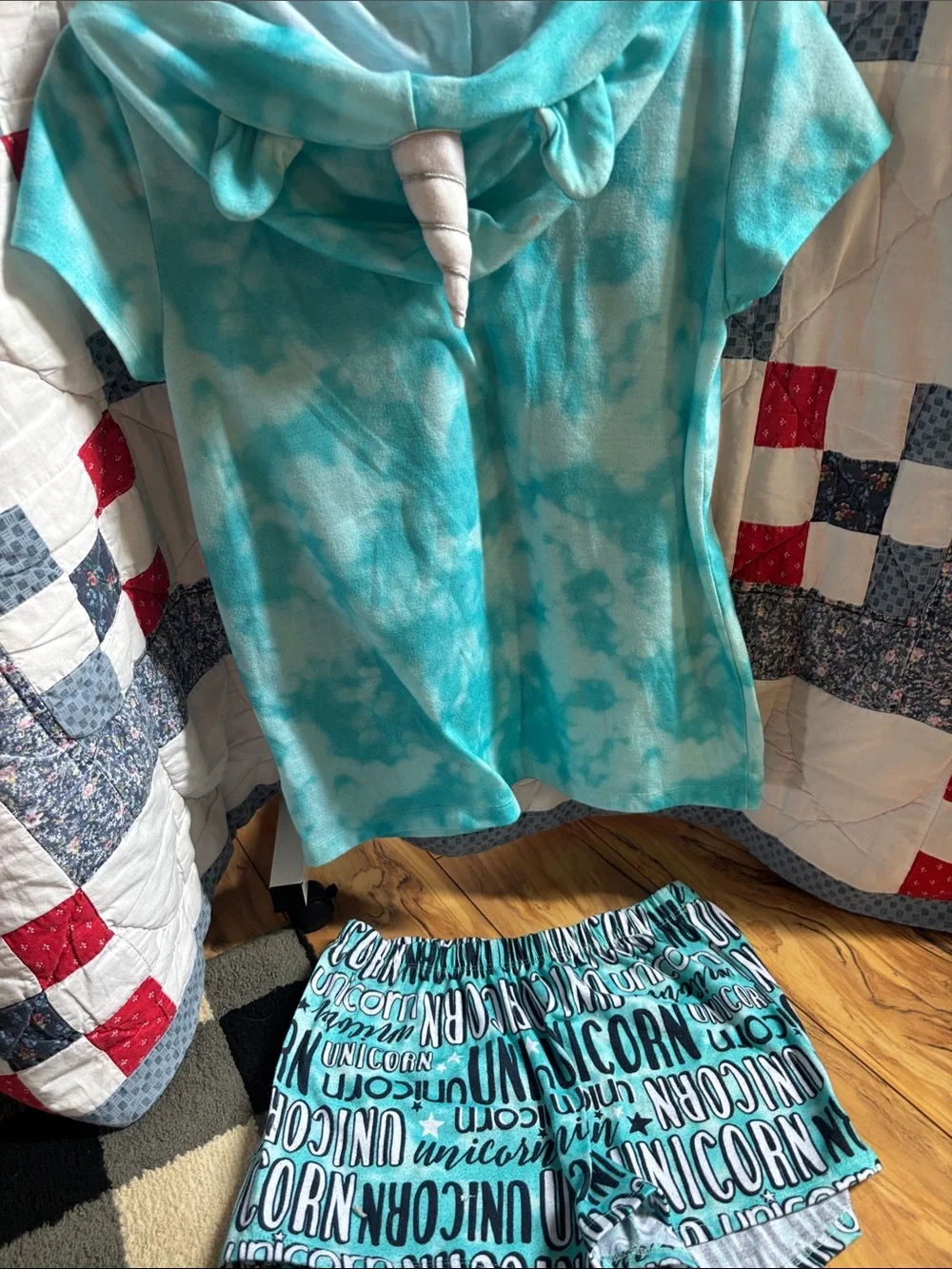 Bundle of 2 PJ’s Justice Turquoise Unicorn Hooded Pajama Set and one other set.