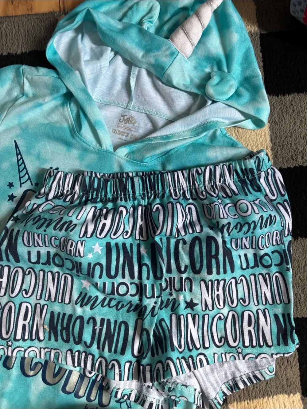 Bundle of 2 PJ’s Justice Turquoise Unicorn Hooded Pajama Set and one other set.