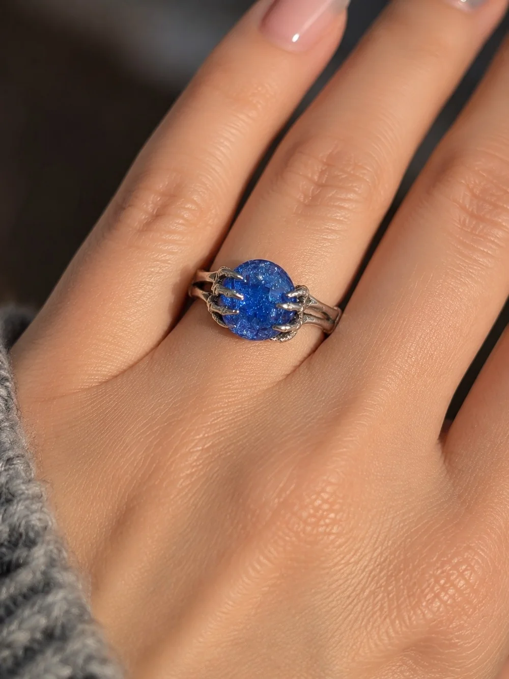 S925 Sterling Silver Ring Features A Brilliant Crackle Blue Gemstone.