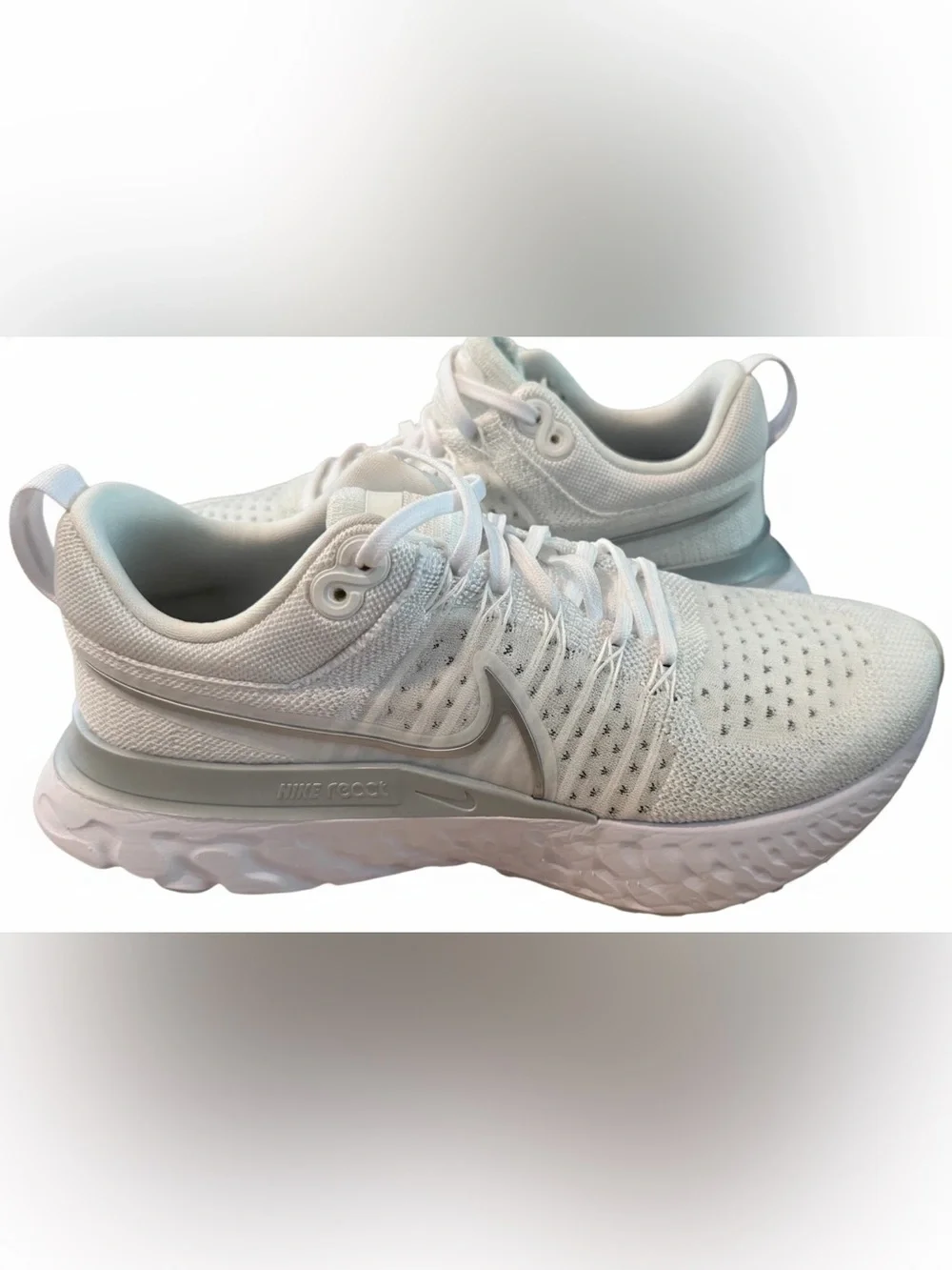 Nike Women’s React Infinity Run Flyknit 2 Sneakers in White/Silver. Size 9.5
