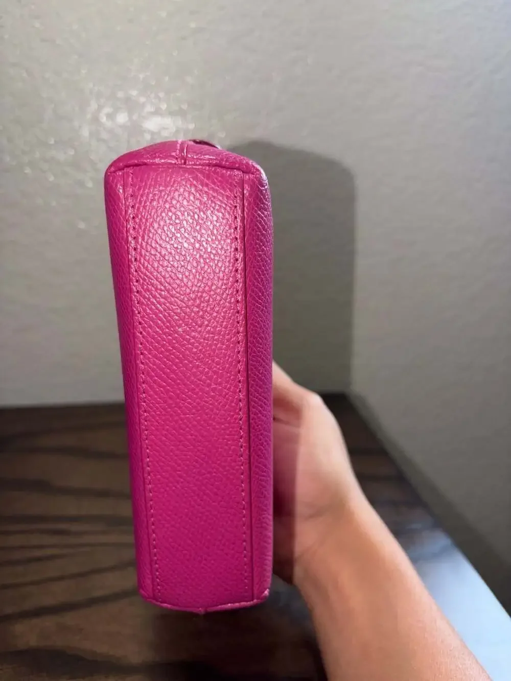 Coach scuffs visible