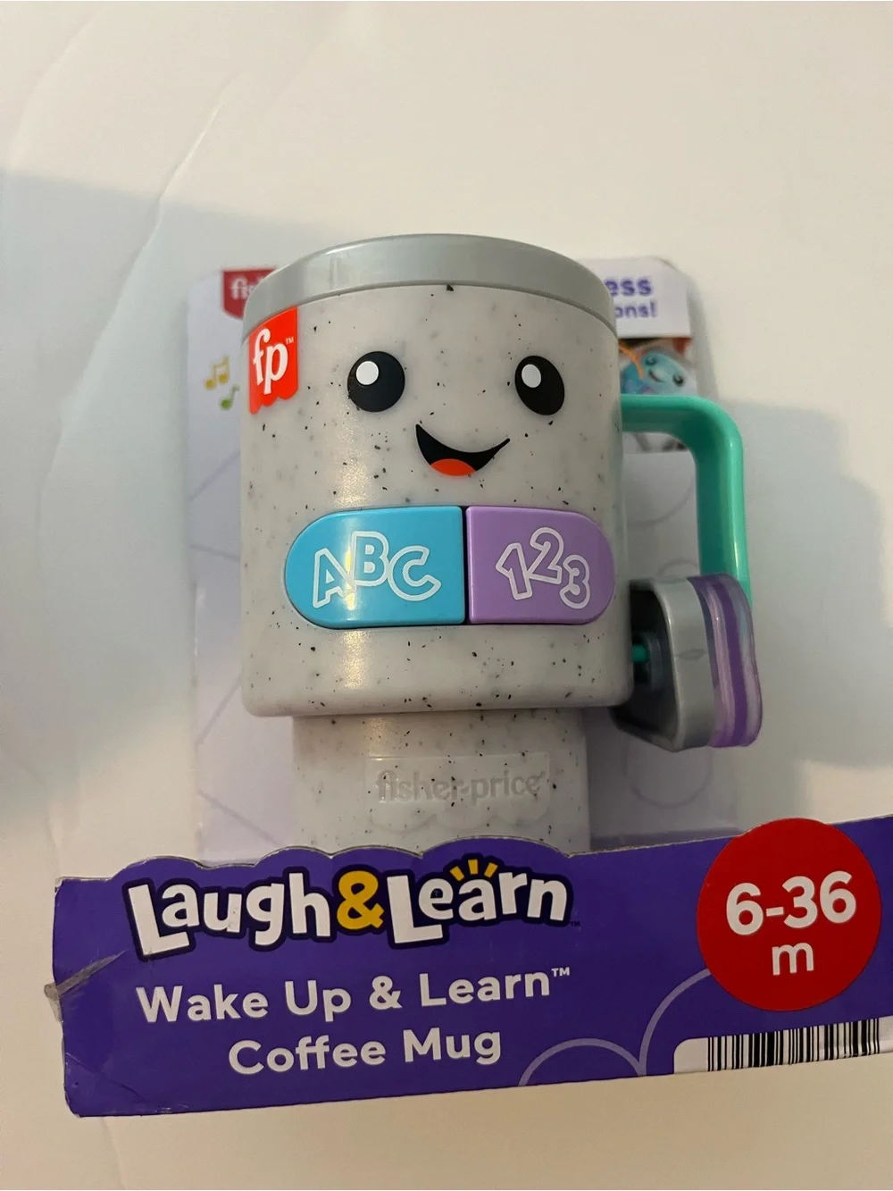 Fisher-Price Laugh & Learn Wake Up & Learn Coffee Mug - Gray with Teal Handle