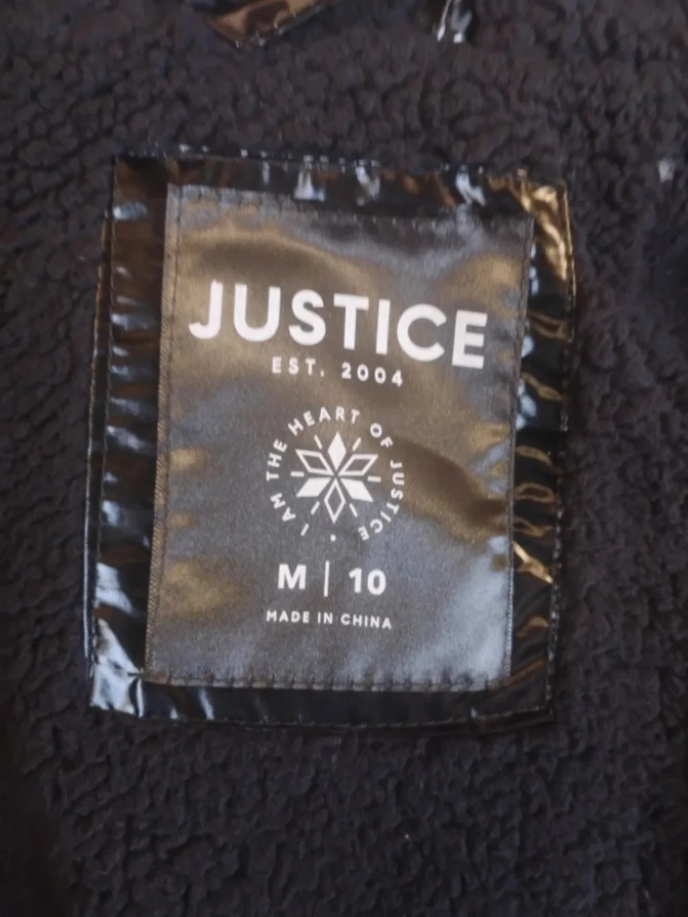 Justice glossy black