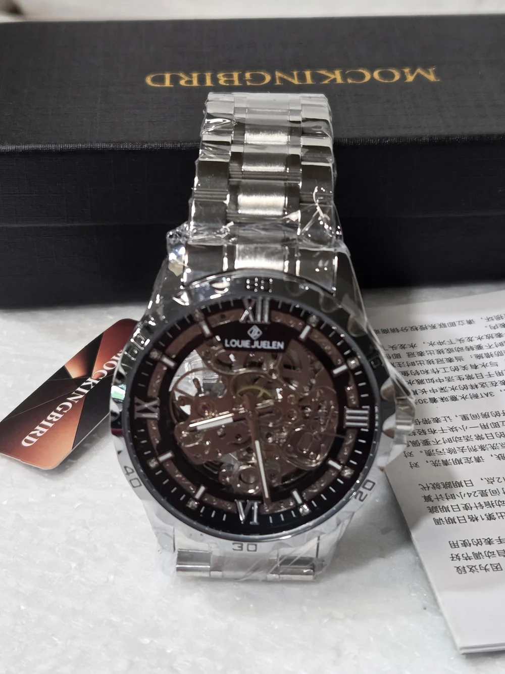 FULLY AUTOMATIC LOUE JUELEN Skeleton Dial Silver Watch