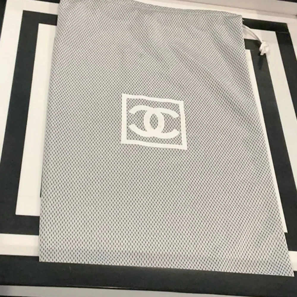 Rare authentic Chanel luxury designer signature mesh storage dust bag