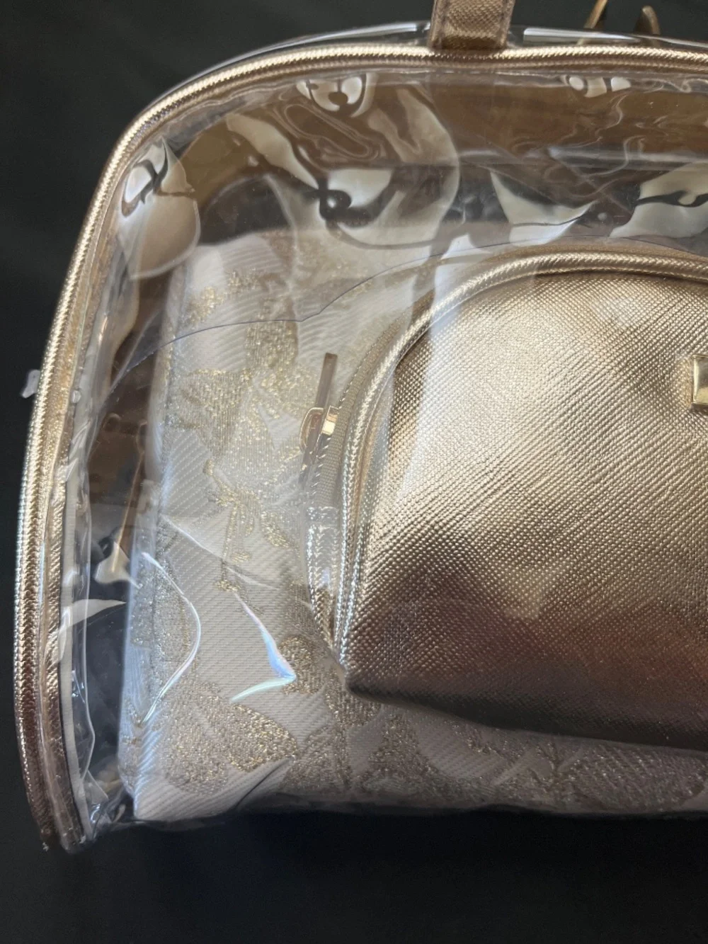 NWT Vince Camuto Clear PVC/Floral/Gold 3 Piece Make /Up bag Set.