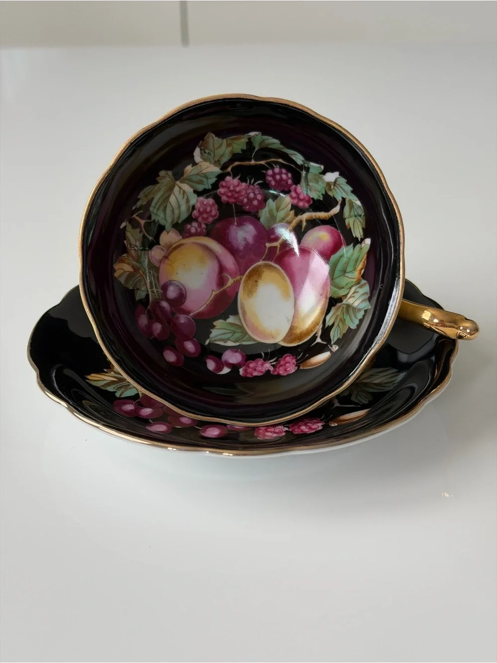 Japan Royal Sealy Vintage Porcelain Black & Gold Fruit Motif Teacup & Saucer Set