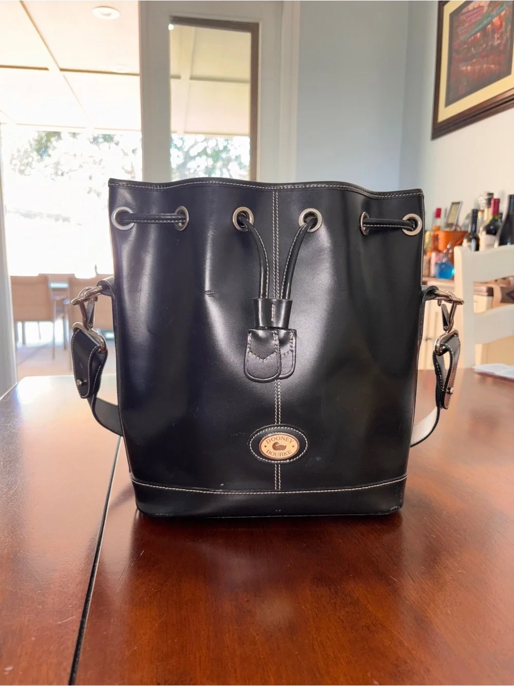 Dooney & Bourke Black Leather Drawstring Bucket Tote with Gold Hardware