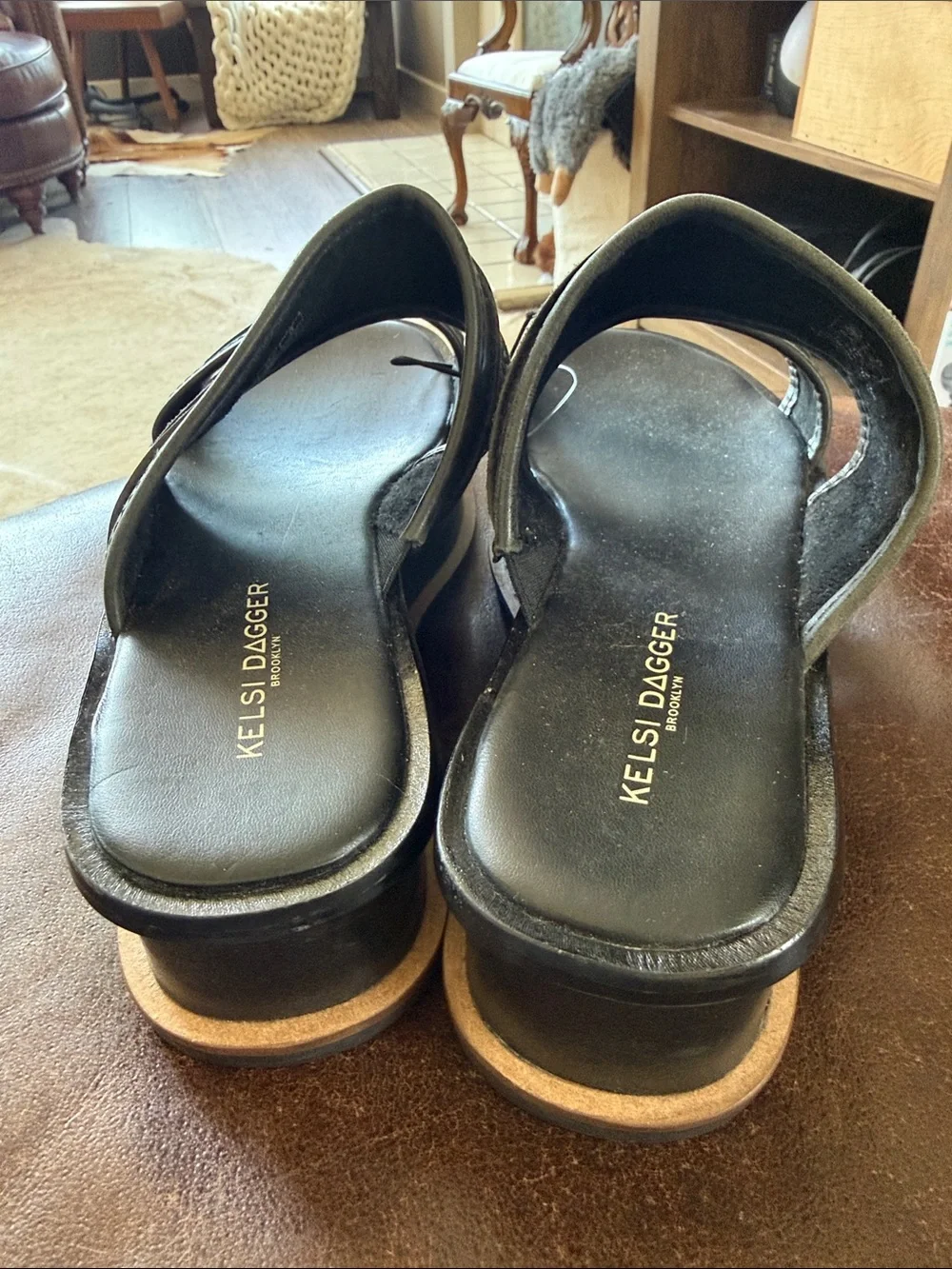 Kelsi Dagger Brooklyn Drift platform slide sandals in black leather featuring 7