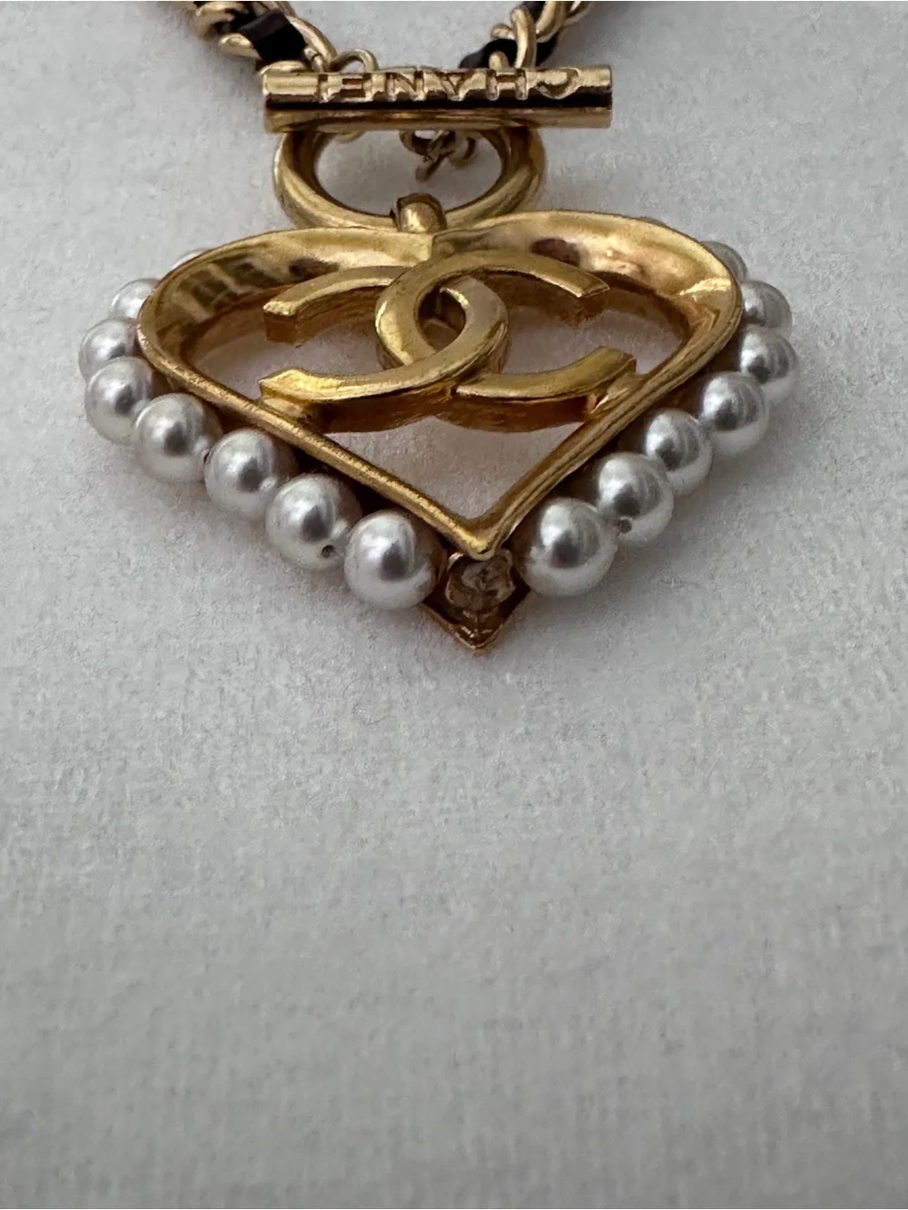 CHANEL Gold and Black Heart CC Pendant Necklace with Pearls
