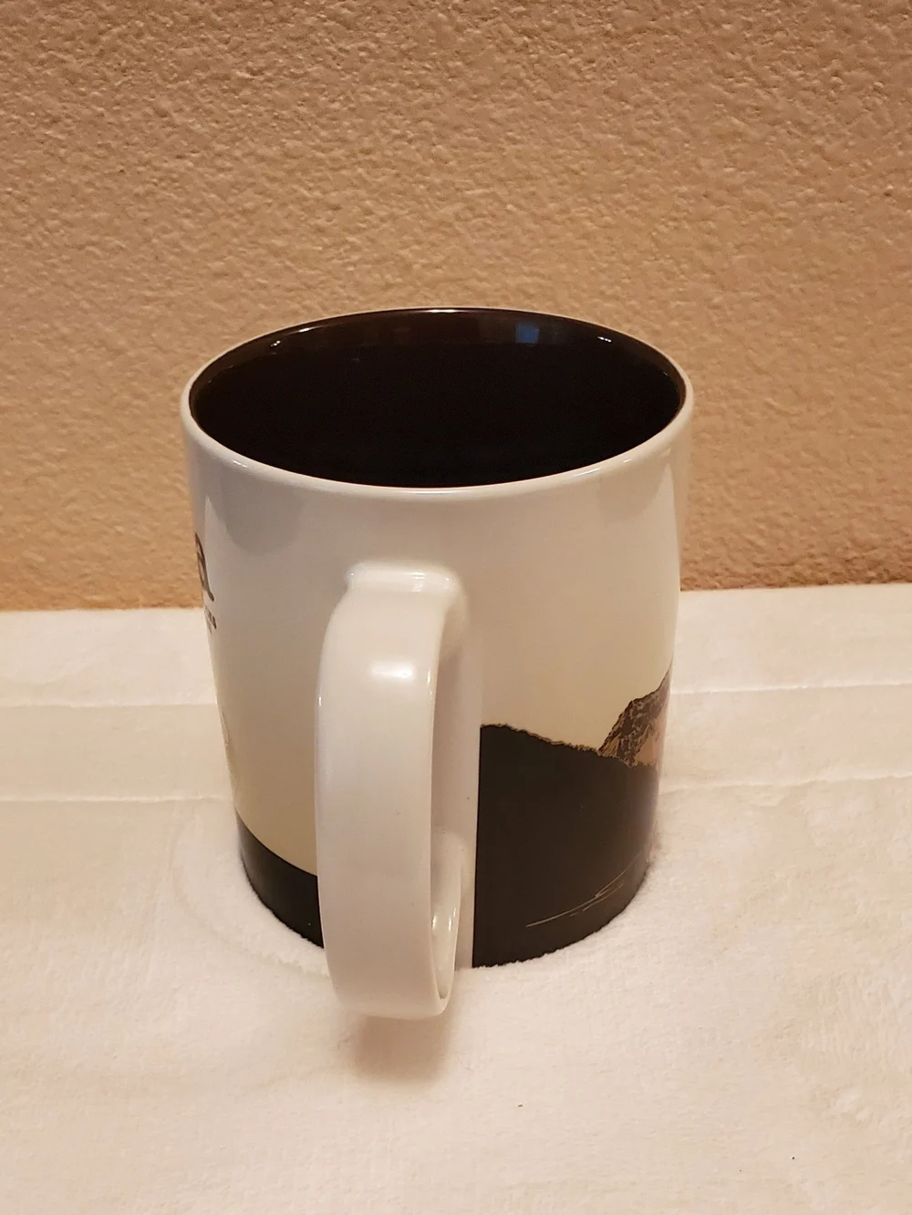 Starbucks Austria Souvenir Mug in Cream & Brown with Tan Hat Artwork