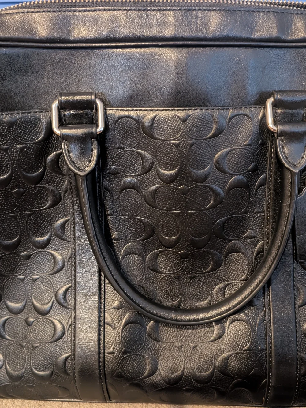 Coach sleek black
