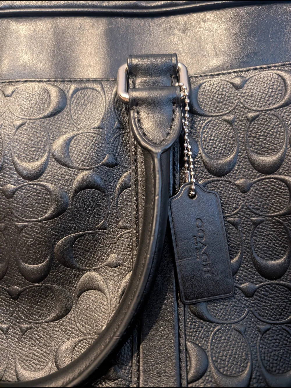 Coach sleek black