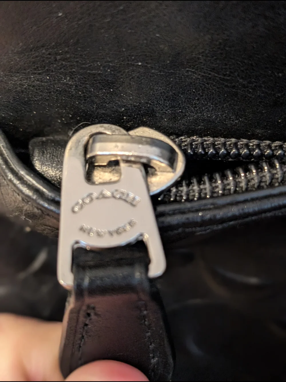 Coach sleek black