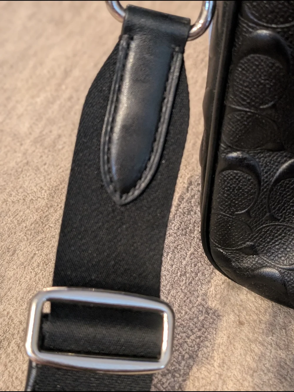 Coach sleek black