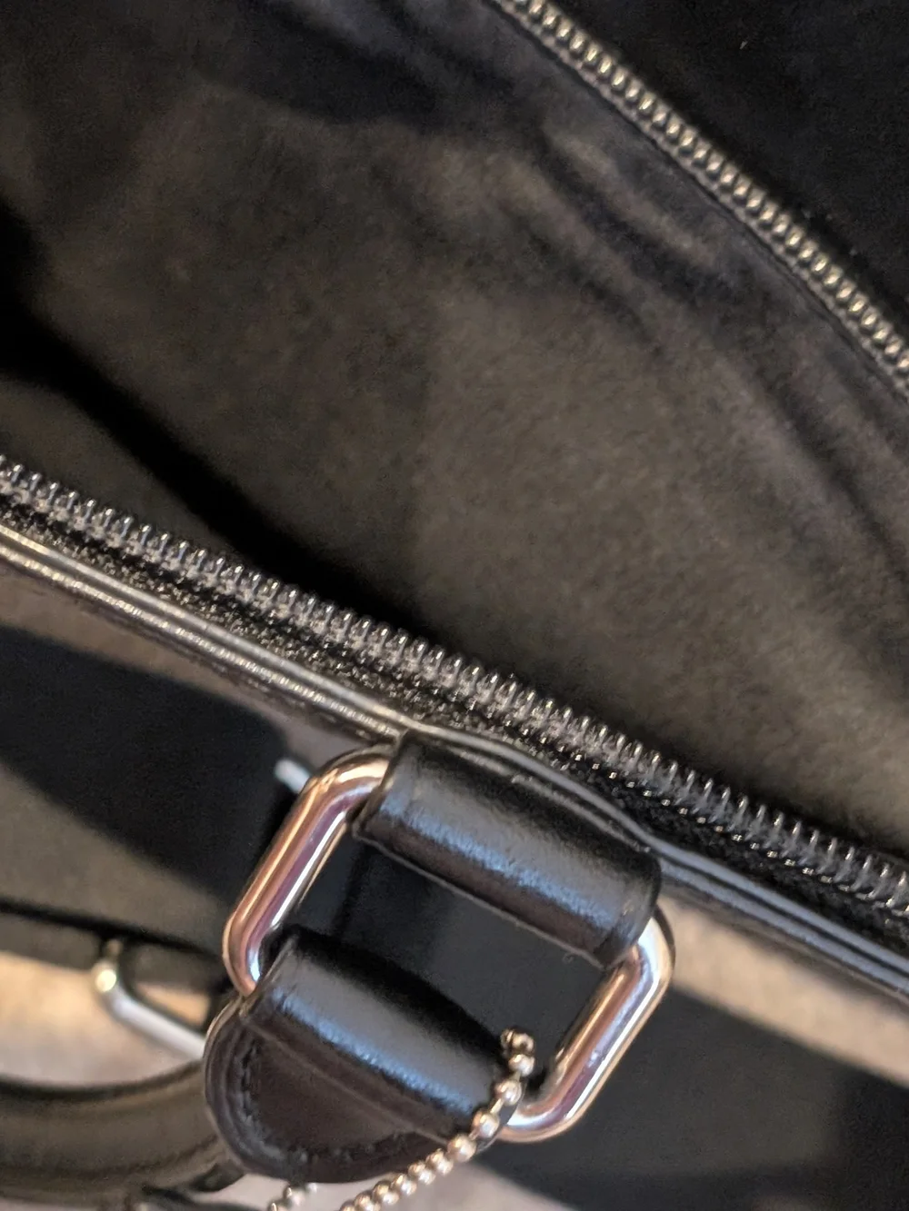 Coach sleek black