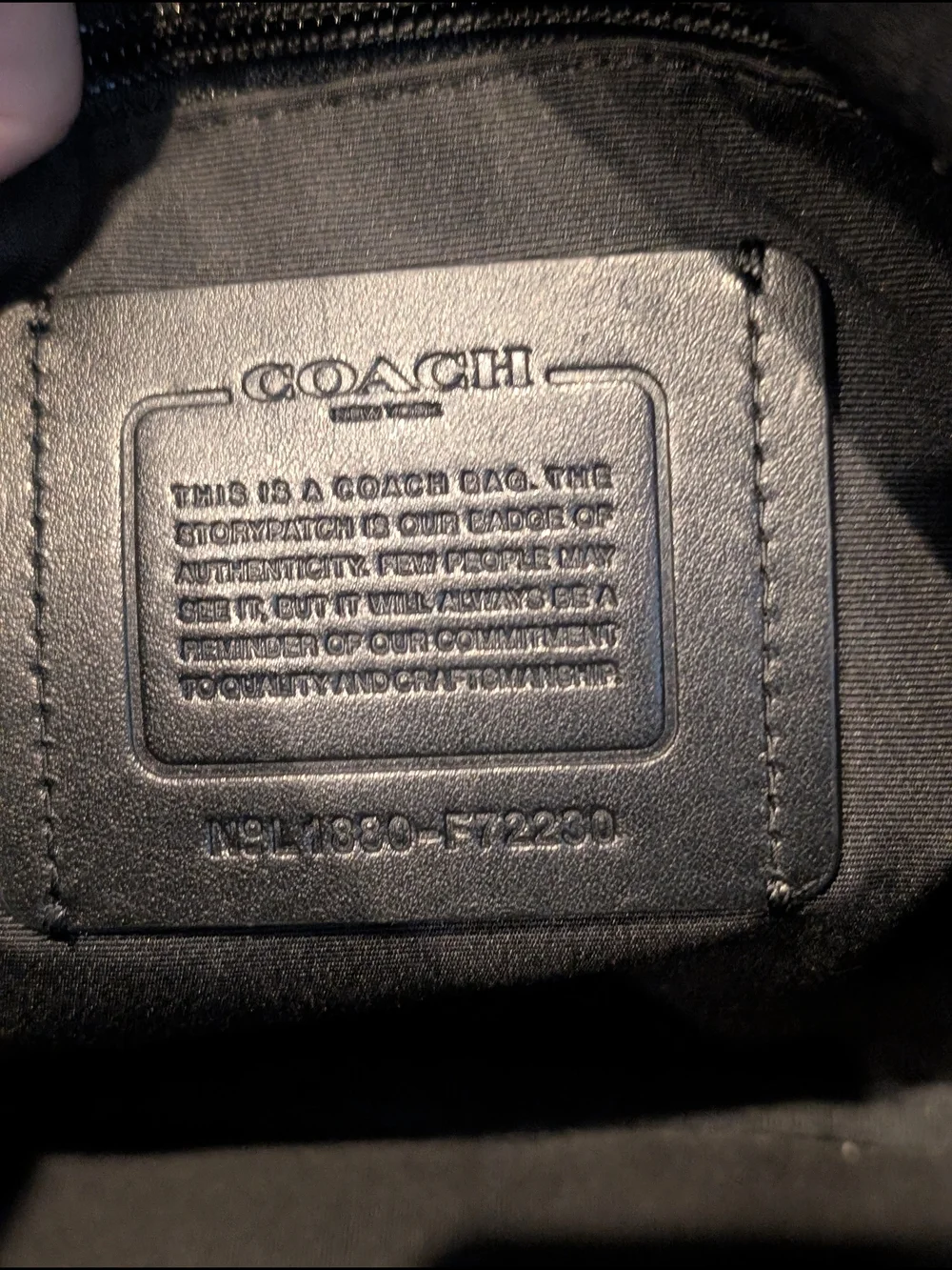 Coach sleek black