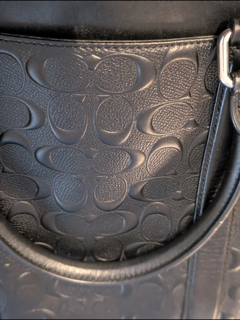 Coach sleek black