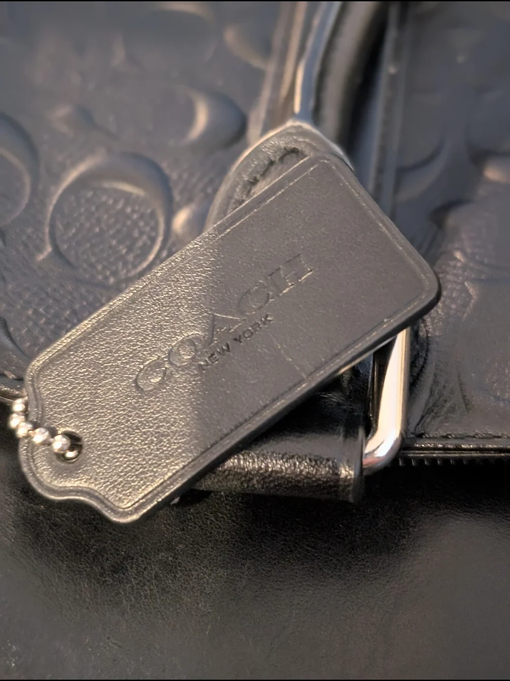 Coach sleek black
