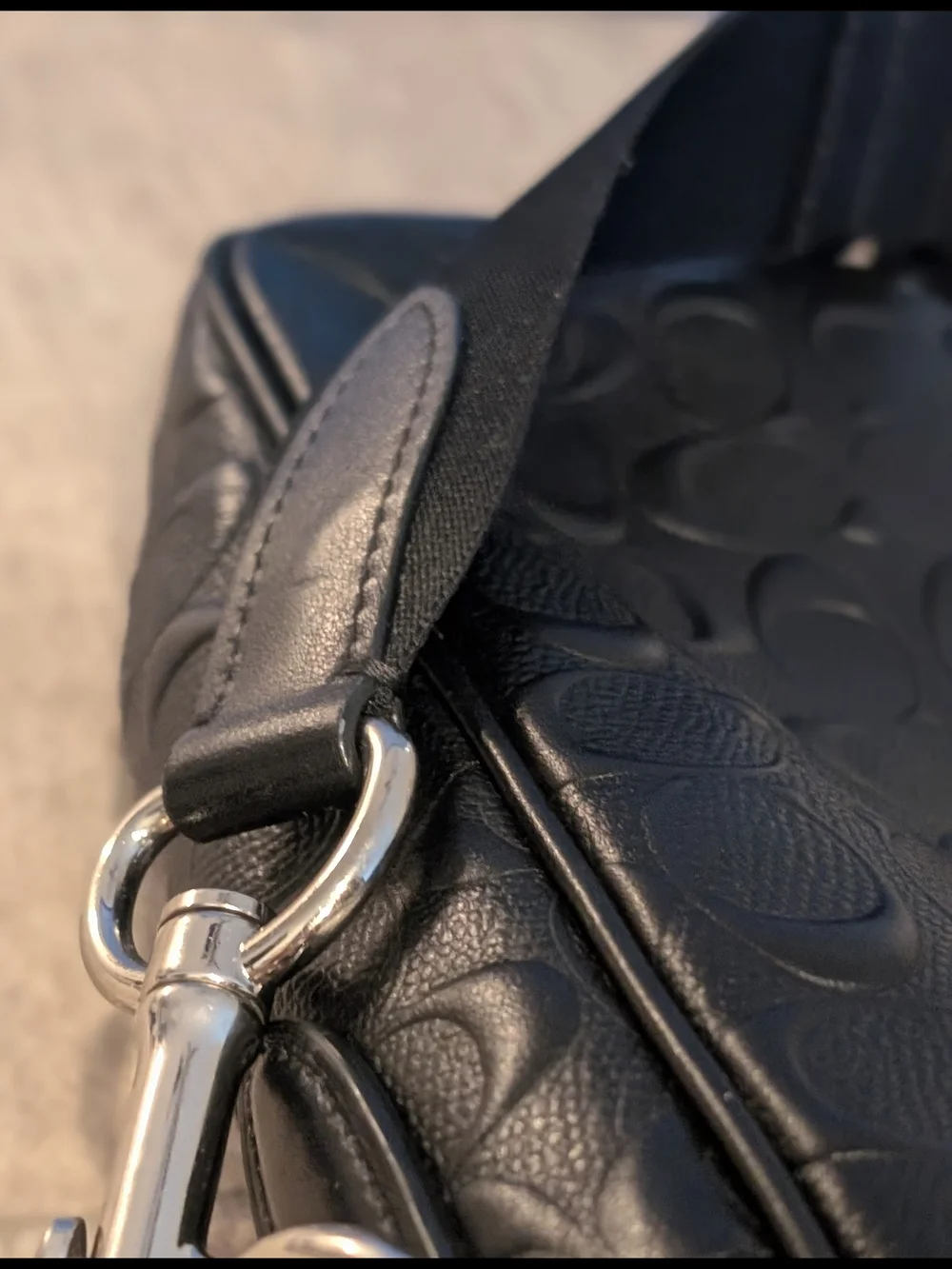 Coach sleek black