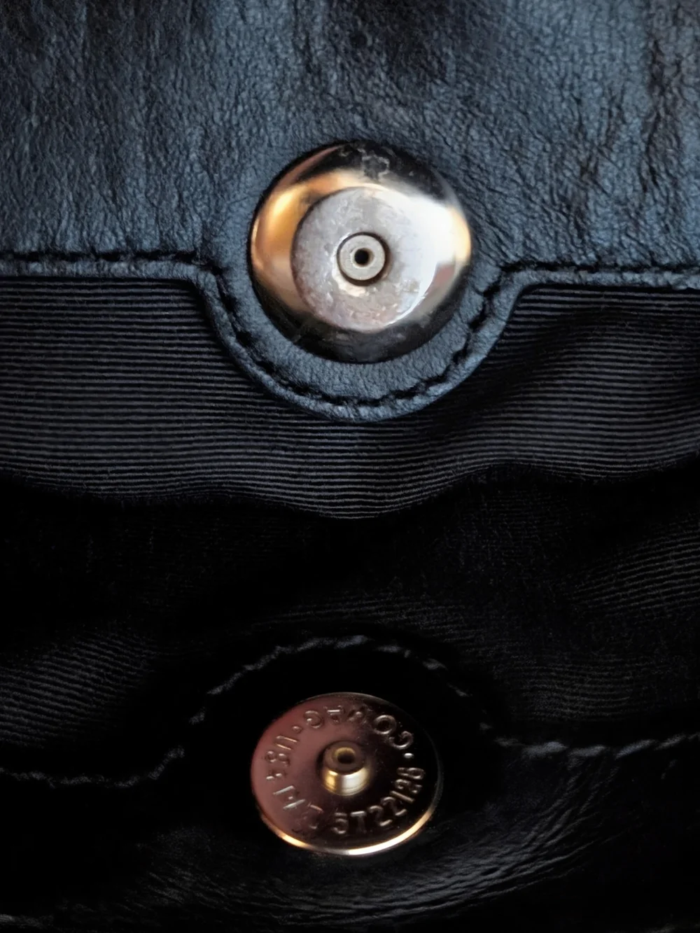Coach sleek black