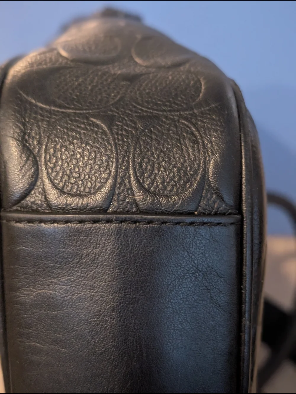 Coach sleek black