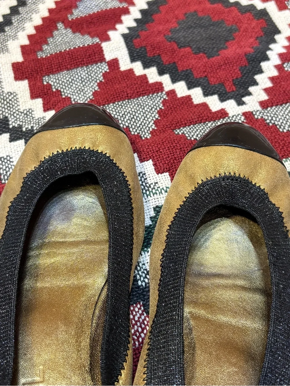 Chanel Gold and Black Cap-Toe Ballet Flats
