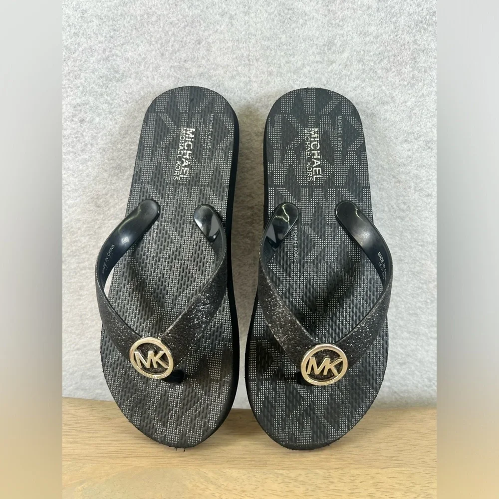 Michael Kors are growing feet