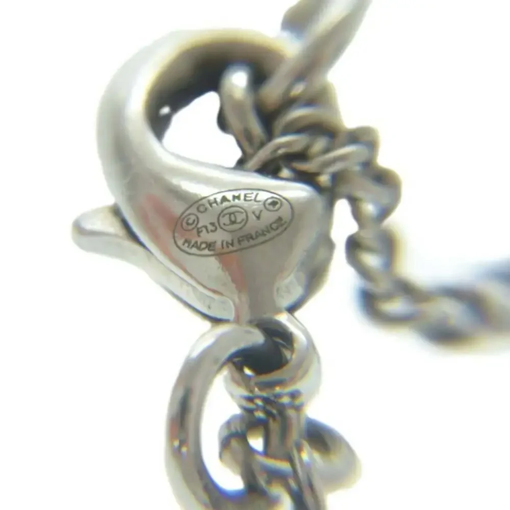 CHANEL silver logo