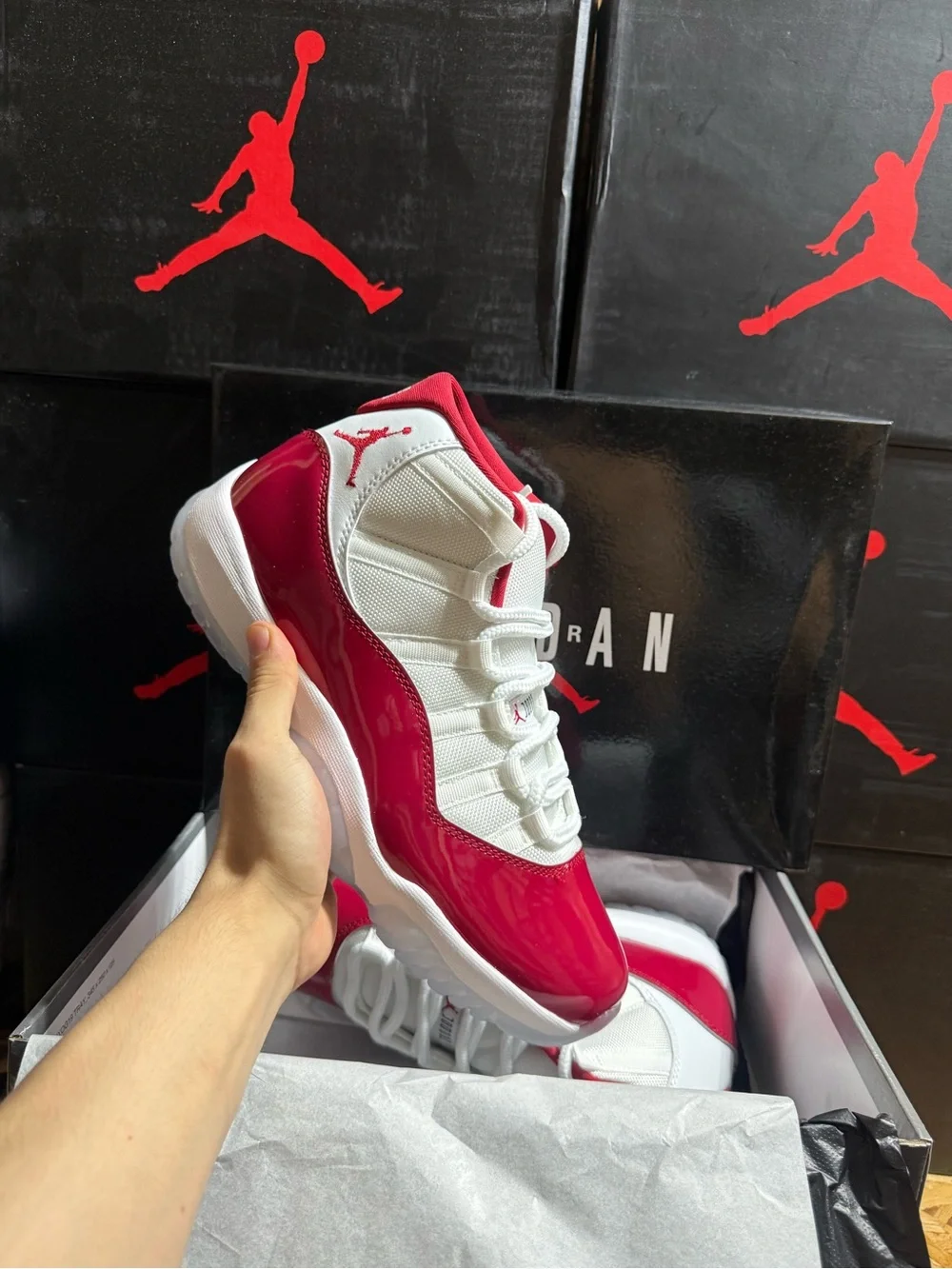 Jordan 11 Retro Cherry Low-Top Sneaker in White & Red