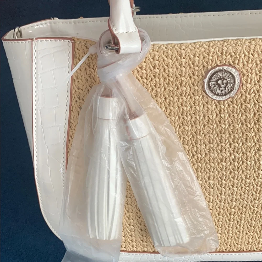 Anne Klein White and Tan Satchel with Chic Tassel with shoulder strap.