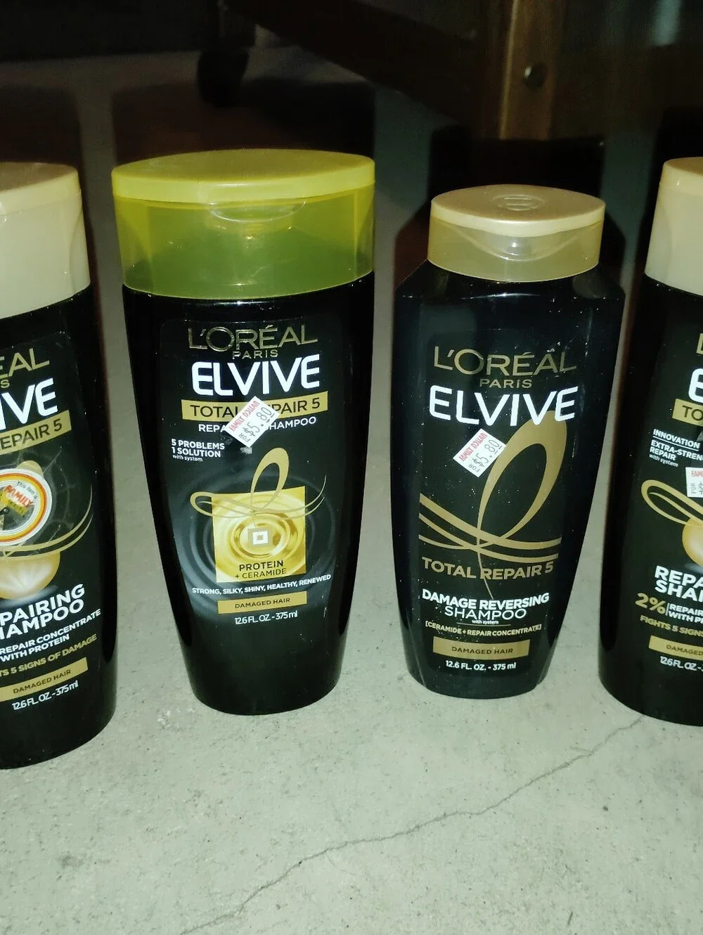 L'Oreal Elvive Repairing Shampoo - Black & Gold Set Of Four. Shampoo Bundle