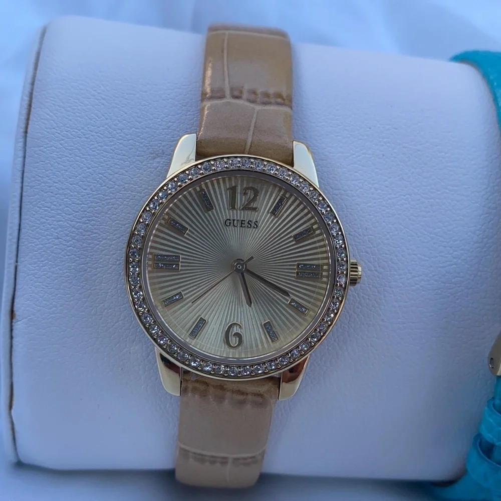 Guess gold tone