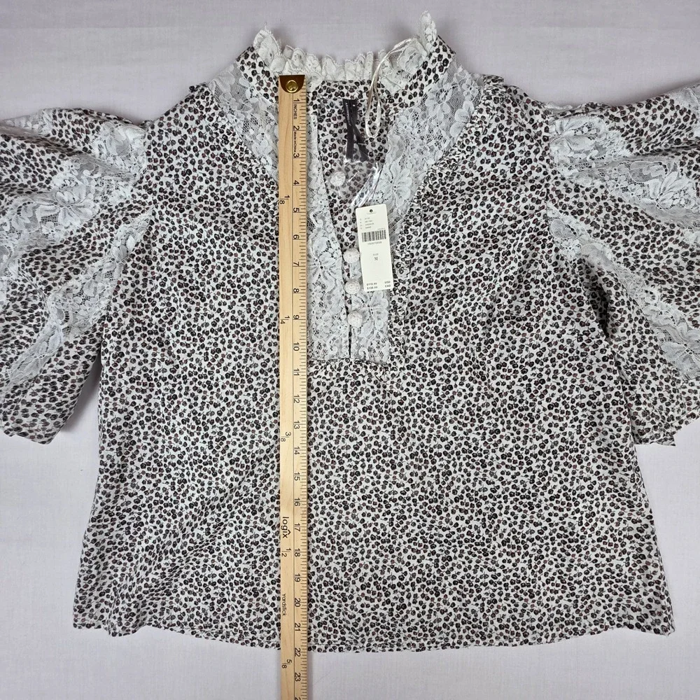 Anthropologie lace trimmed