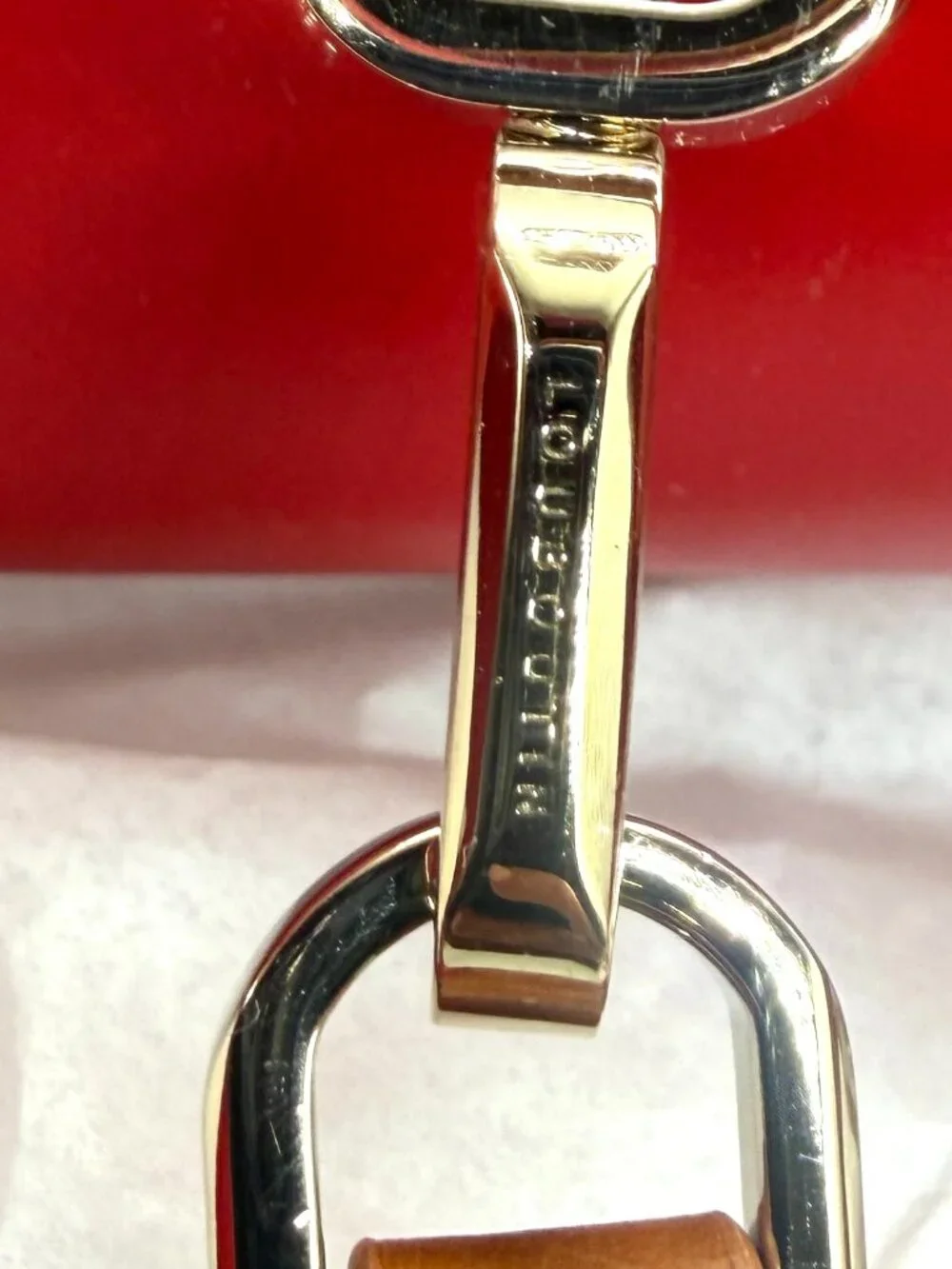 Christian Louboutin metal drop carry