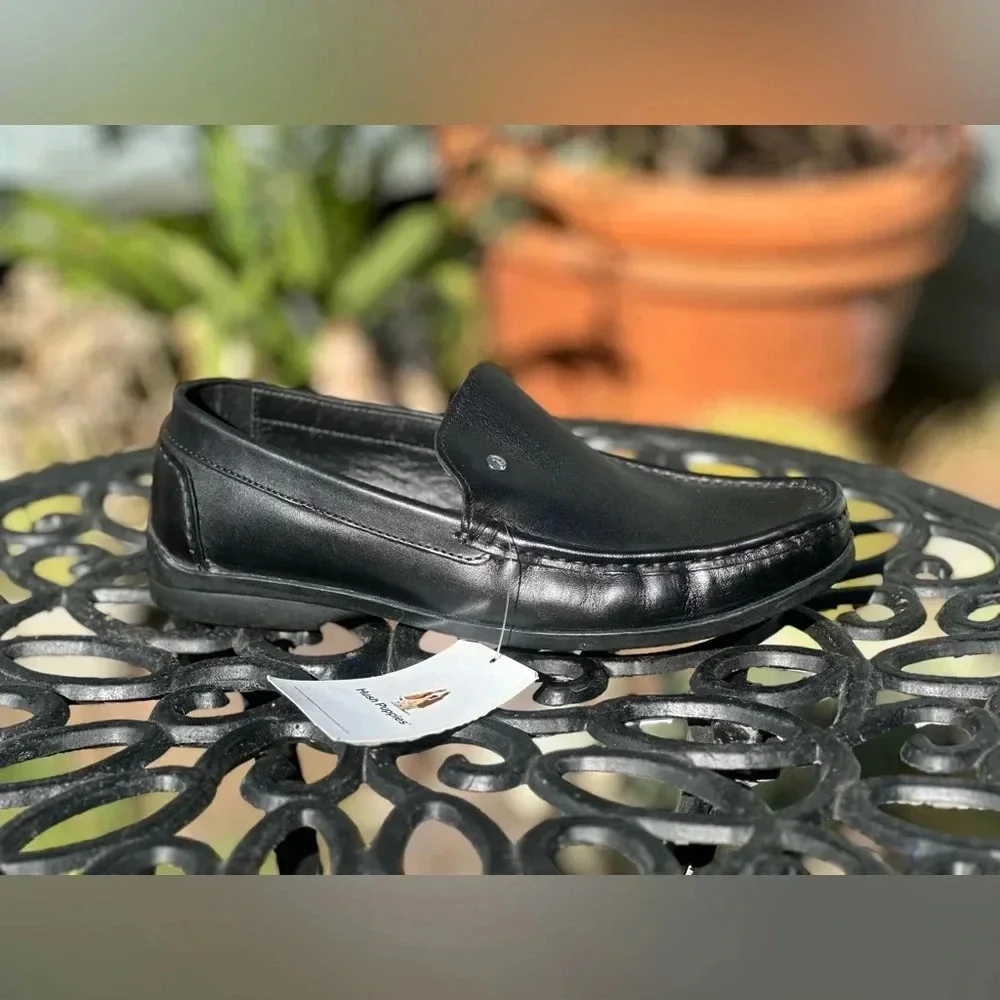 Hush Puppies — Black Leather Loafers