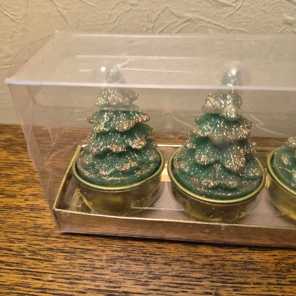 Green Christmas tree candles with gold glitter