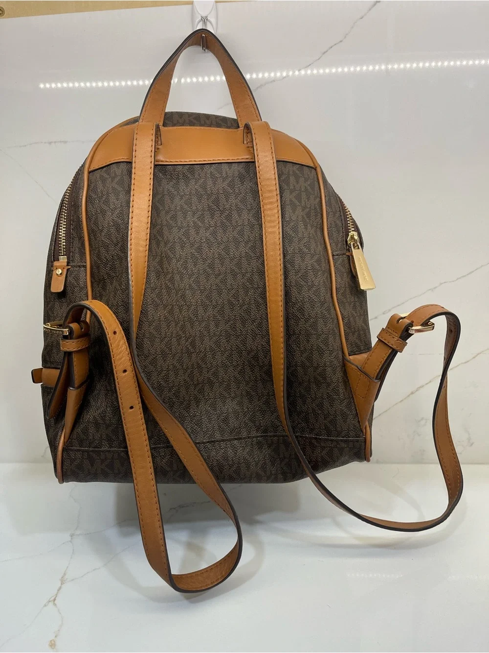Michael Kors signature luggage separate