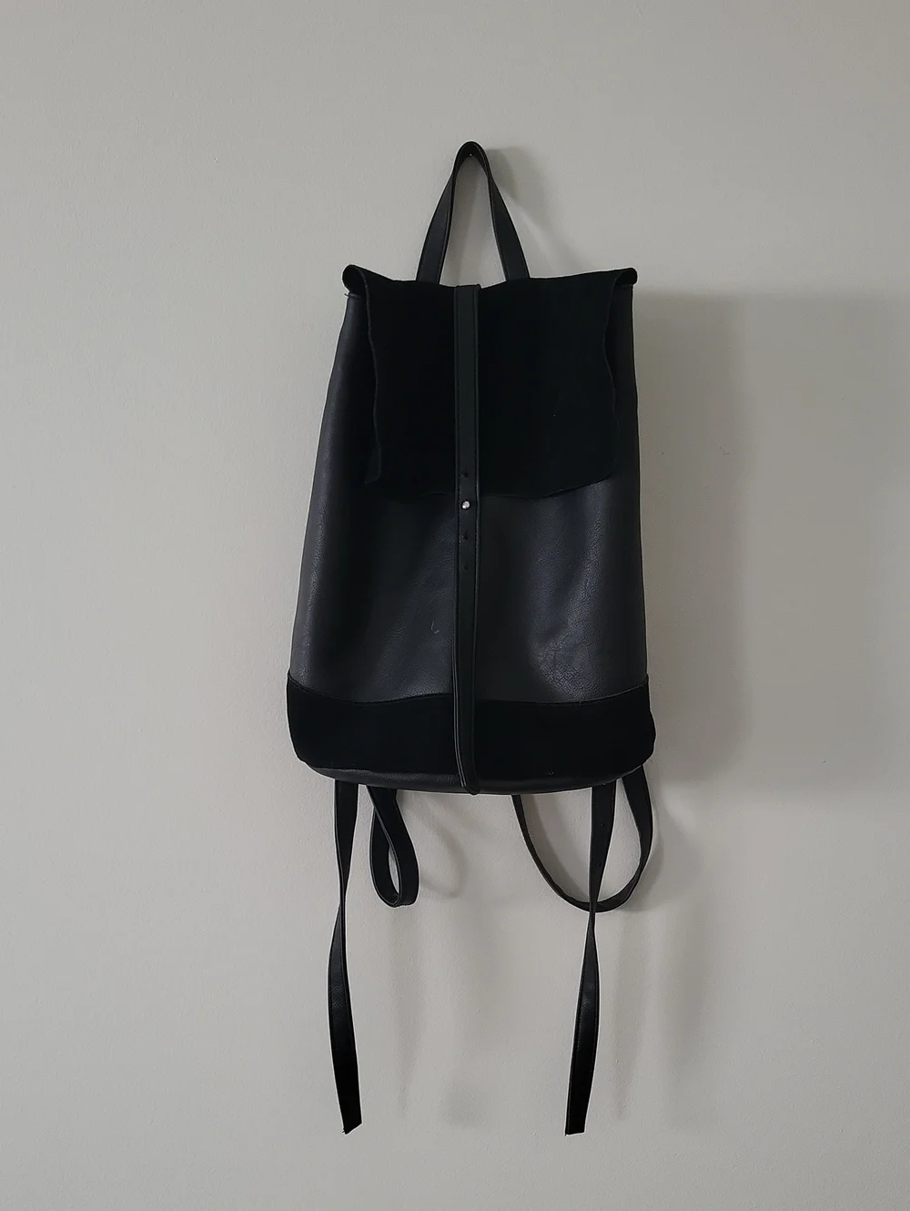 Black Faux Leather and Suede Fold-Over Backpack