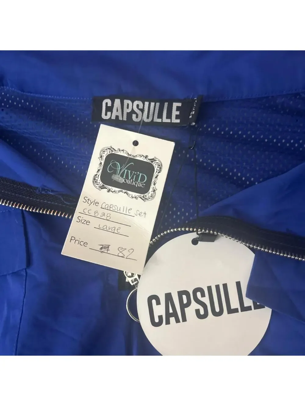 Capsulle blue mesh panel track suit set New with tags. Size: L