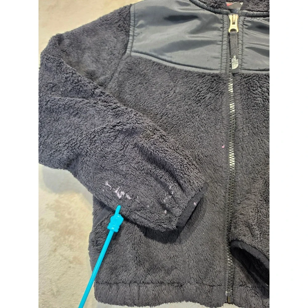 The North Face stuck sleeves