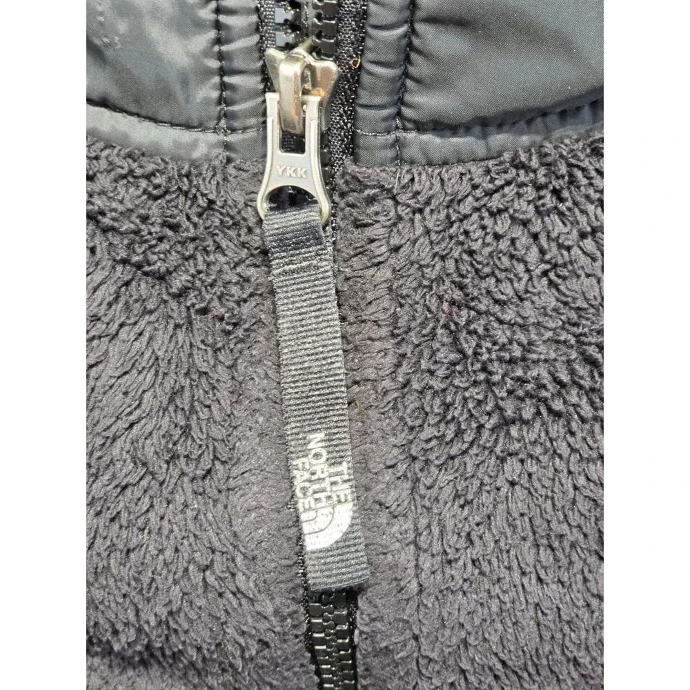 The North Face 15 logo